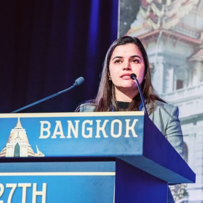 Dr Shalini Malhotra speaking at a professional hair transplant conference